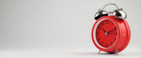 The Vintage Red Alarm Clock Signifying Time and Punctuality in Daily Life photo