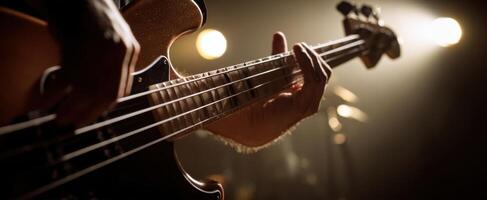 The captivating moment of a bassist performing on stage with passion. photo