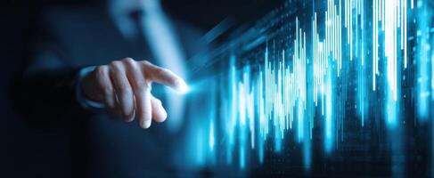 The Businessman Interacting with Digital Analytics Through a Touch Interface. photo
