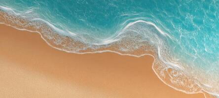 The serene ocean waves gently caressing the sandy beach at sunrise. photo