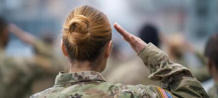 The soldier saluting in military uniform during a ceremonial event. photo