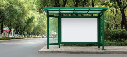 The empty bus stop shelter amid lush green scenery in a quiet urban area. photo