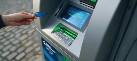 The user interacting with an ATM to complete a cash withdrawal transaction. photo