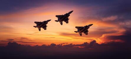 The jets flying majestically against a breathtaking sunset backdrop. photo