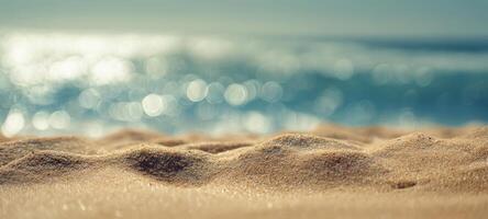 The Tranquil Beach Scene with Soft Sand and Blurry Ocean Waves photo