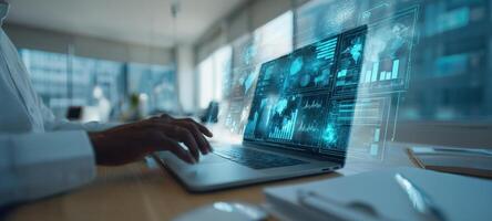 The laptop displaying futuristic data analytics in a modern workspace setting. photo