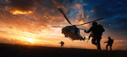 The helicopter hovering while illuminated soldiers prepare for an intense mission. photo