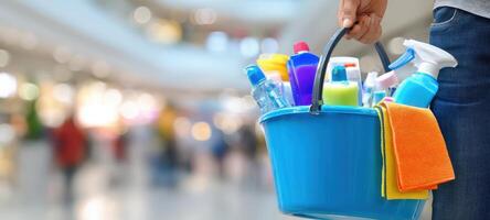 The vibrant cleaning supplies bucket ready for effective home maintenance. photo