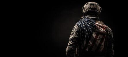 The Soldier Standing Proudly with the American Flag Draped Behind Him photo
