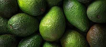 The vibrant arrangement of fresh green avocados ready for culinary delights. photo