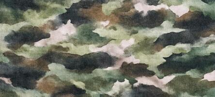 The textured camouflage pattern in earthy tones and soft watercolor style. photo