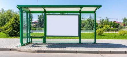 The bus stop shelter with a blank advertising space on a sunny day. photo