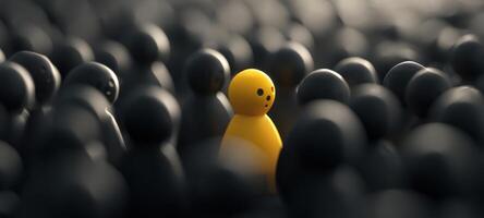 The Bright Yellow Figure Standing Out in a Sea of Dark Silhouettes photo