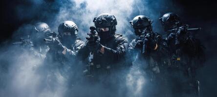 The tactical team of soldiers prepares for an intense operation in the smoke. photo