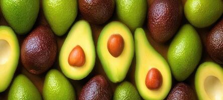 The vibrant assortment of avocados showcasing their rich colors and textures. photo