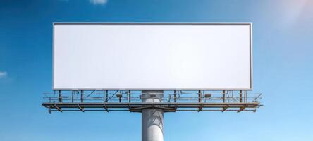 The empty billboard under a clear blue sky waiting for new advertisements. photo