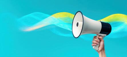 The Megaphone Emitting Colorful Sound Waves Against a Blue Background. photo