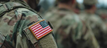 The American flag patch on a soldier's uniform symbolizing dedication and service. photo