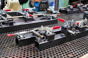 Toggle clamp for locking welding machine parts. For clamping workpieces and inspection JIGs photo