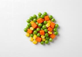 A Colorful Medley of Frozen Mixed Vegetables Peas, Carrots, and Corn photo