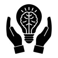hands holding a light bulb with a brain inside vector