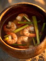 Close Up of Delicious Shrimp Soup in a Rustic Bowl. photo