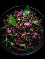 Spicy Beef Stir-fry with Red Amaranth and Chili Peppers A Culinary Delight. photo