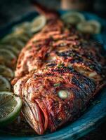 Close up of a grilled fish with lemon and lime slices. A mouthwatering image perfect for food blogs, magazines, and restaurant menus. photo