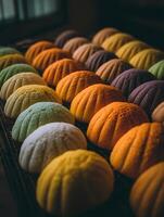 Colorful Melon Pan Breads Arranged in a Row. A close up image showcasing the vibrant hues and textures of freshly baked goods. photo