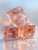 Stack of Translucent Amber Ice Cubes with Frost, Close Up. photo