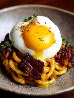 Gourmet Pasta Dish with Poached Egg and Crispy Bacon. A close up image of a delicious culinary creation. photo