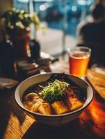Delicious Ramen Noodles in a Bowl on a Wooden Table. A close up image of a tasty and warm ramen dish. photo
