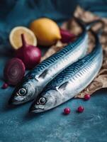 Fresh Mackerel Fish with Lemon and Red Onion on Rustic Background. A close up image of two whole mackerel fish, ready for cooking. photo
