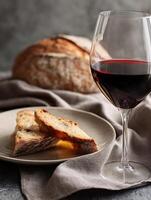 Crusty Bread and Red Wine A Still Life of Simple Pleasures. photo