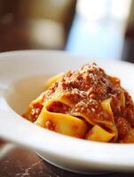 Close up of Delicious Pasta with Bolognese Sauce. A mouthwatering image of perfectly cooked pasta in a rich and savory meat sauce. photo