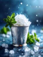 Refreshing Mint Julep Cocktail in a Metal Cup with Ice and Water Splashes. photo