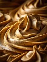 Close Up of Creamy Brown Buttercream Frosting Swirls. A delectable image perfect for food blogs, recipe websites, or bakery marketing. photo