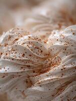 Close Up of Creamy Dessert with Crumble Topping. A detailed image showcasing the texture and swirls of a delicious-looking confection. photo