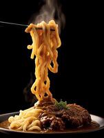 Delicious Japanese Curry Udon Noodles with Crispy Fried Pork. A close up photo of steaming udon noodles being lifted from a rich curry dish.