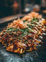 Close up of Okonomiyaki, a Savory Japanese Pancake. photo