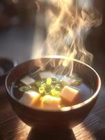 Warm Miso Soup with Tofu and Green Onions in a Wooden Bowl. A close up image of a steaming bowl of miso soup, perfect for representing comfort and warmth. photo