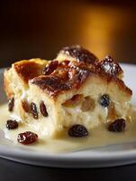 Close up of Delicious Bread Pudding with Raisins and Creamy Sauce. photo