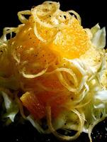 Close Up of a Delicious Orange and Cabbage Salad with a Zesty Dressing. photo
