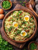 Creamy Spaghetti Carbonara with Soft Boiled Eggs and Crispy Bacon in Rustic Wooden Bowl. photo
