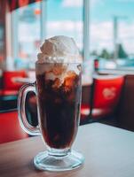 Refreshing Ice Cream Soda in a Glass Mug. A close up image of a delicious ice cream soda, perfect for summer refreshment. photo