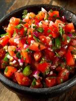 Fresh Tomato Salsa in Rustic Bowl Close up of vibrant diced tomatoes, red onions, and cilantro. photo