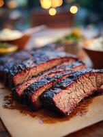 Close Up of Delicious Smoked Brisket Slices on Butcher Paper. photo