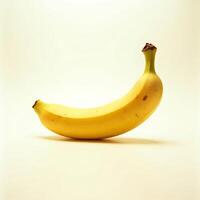 Single Banana Fruit Isolated on Plain Background Ready to Eat photo
