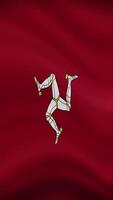 Isle of Man Waving Flag in Vertical Orientation. Realistic Flag Animation. Seamless Loop Background. video