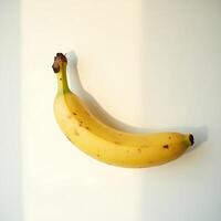 Single Banana Close-up on White Background with Natural Light photo